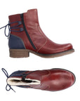 Red leather ankle boot with low heel, navy heel counter and navy lace detail on heel. Boot has inside zipper.