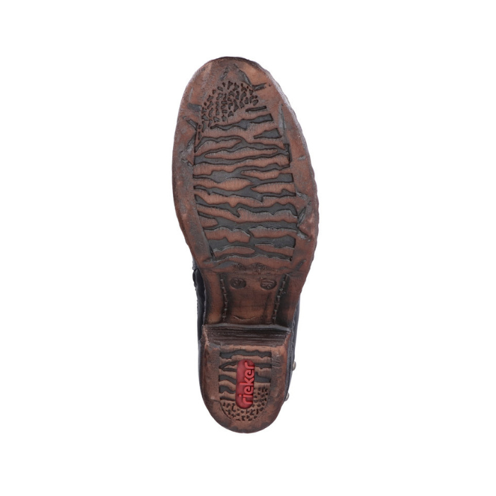 Brown rubber outsole of tall boot with red Rieker logo on heel.