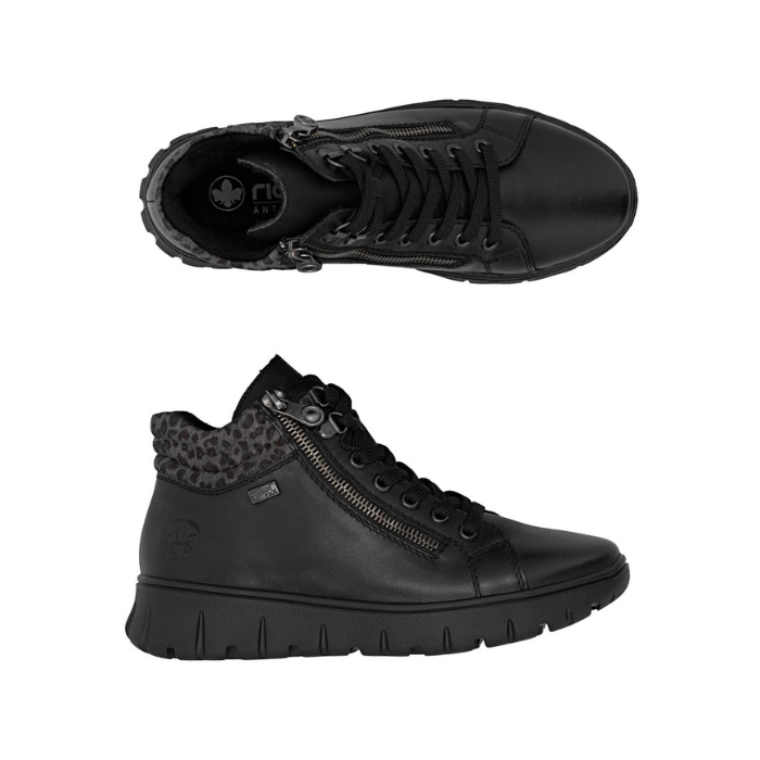 Pair of black ankle boots with dual zipper, black laces, black leopard print cuff and black  light treaded outsole.