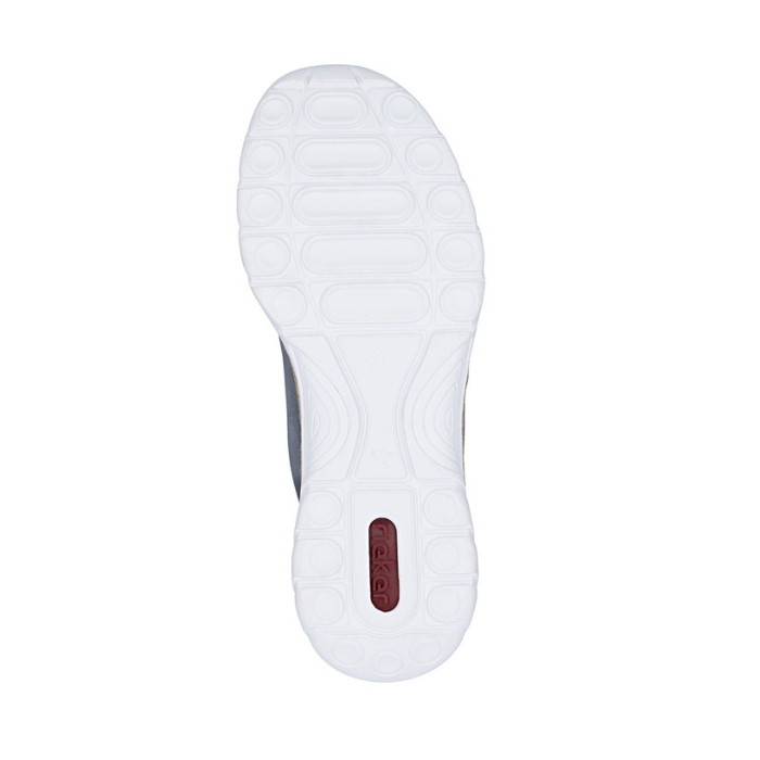 White light treaded outsole with circle and oval patterns and red Rieker logo stamped on heel.