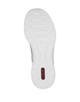 White light treaded outsole with circle and oval patterns and red Rieker logo stamped in heel.