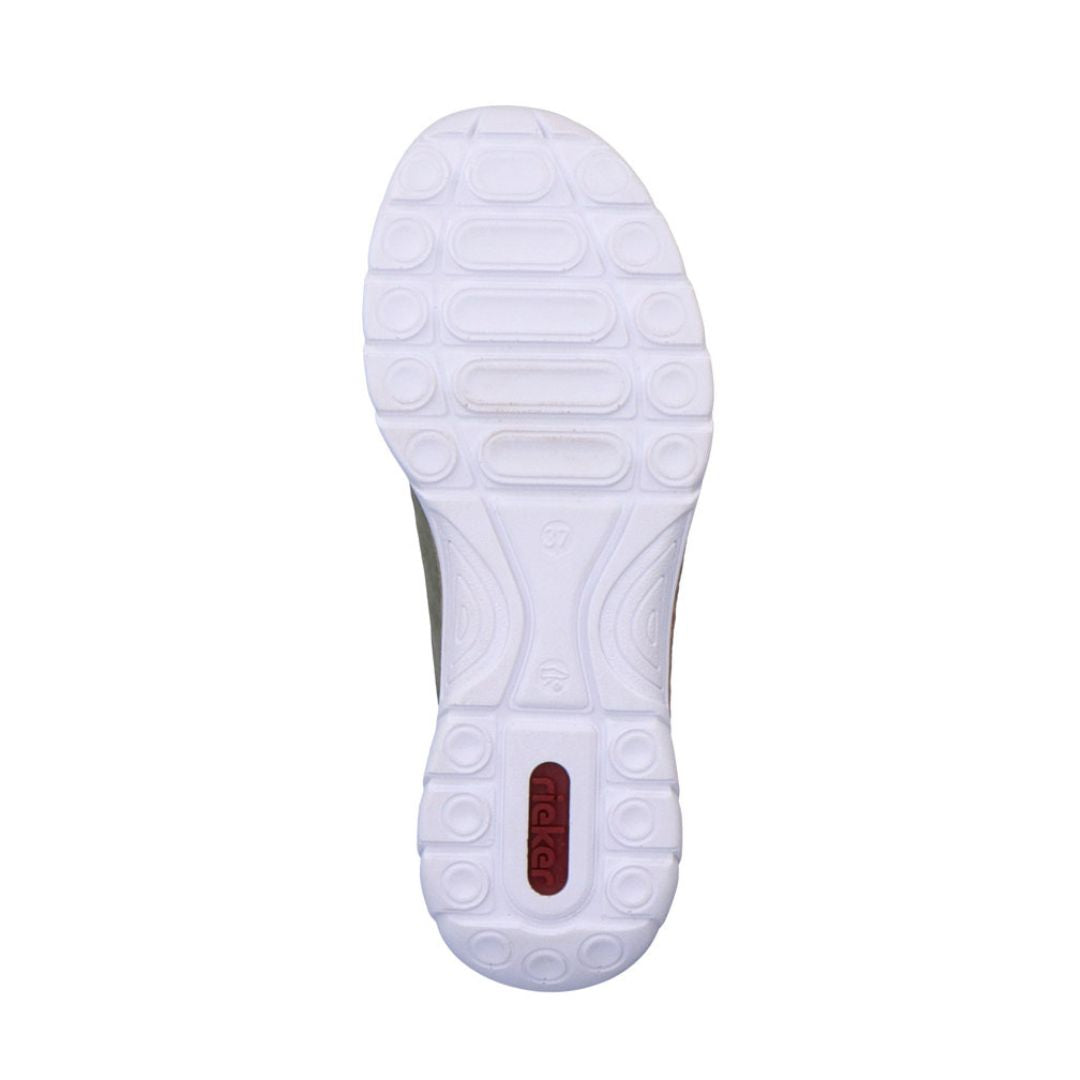 Outsole view of the Rieker N42G0 slip-on sneaker for women, featuring a white textured sole for enhanced grip and flexibility.