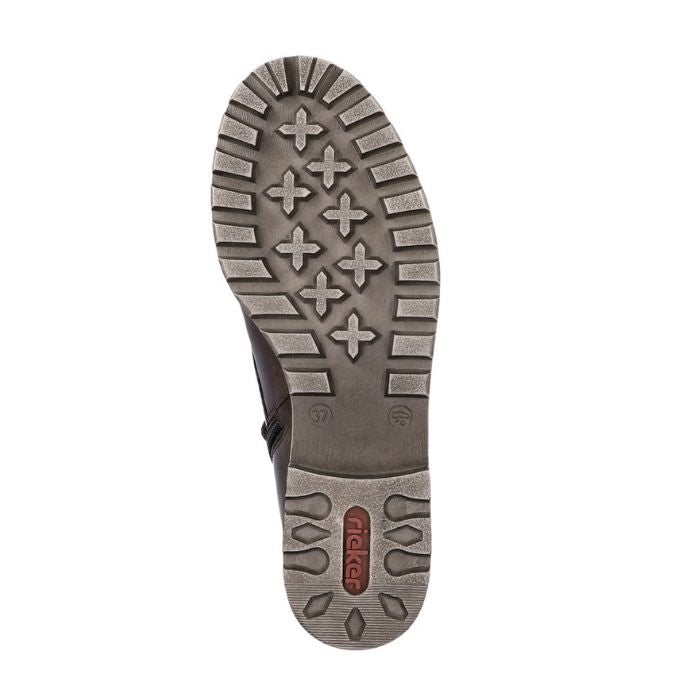 Beige outsole with traction and red Rieker logo on heel.