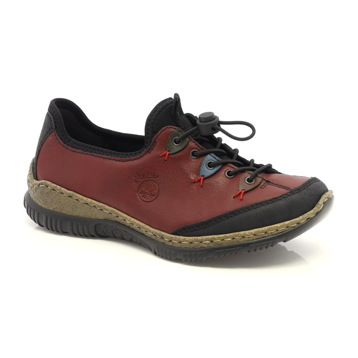 Red slip on sneaker with bungee lace, colorful accent eyelets with black toe wrap, brown midsole and black outsole.