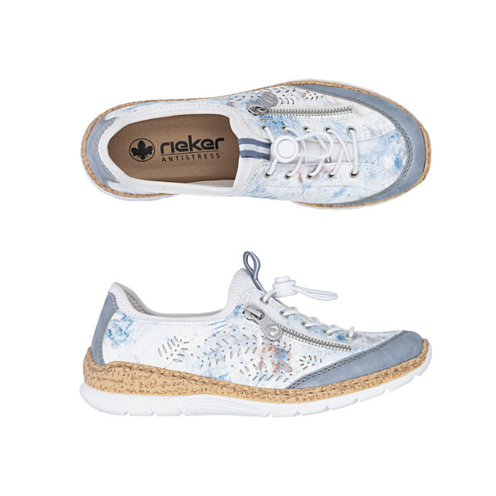Pair of A white Rieker bungee cord slip-on sneakers with decorative leaf perforations and blue accents throughout upper, decorative side zipper, faux cork midsole and white outsole.