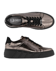 Pair of Metallic bronze sneakers with thick black laces, black heel cap, accent stitching, grey Rieker logo'd footbed and thick black platform outsole.