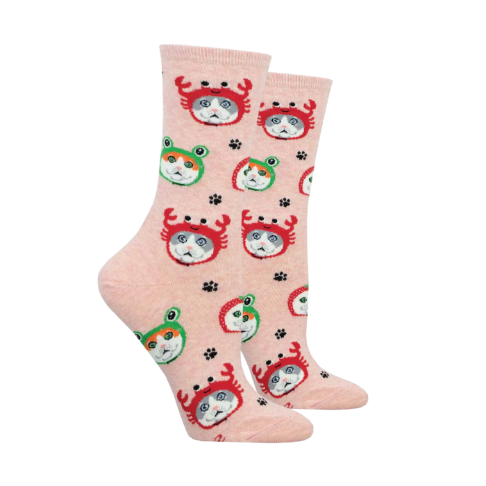 Socksmith Women's Cat Hats Socks featuring cats in crab and frog hats on a pink background. Available at White-Balmer Shoes.