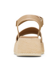 Heel of Beige sandal with woven sole.