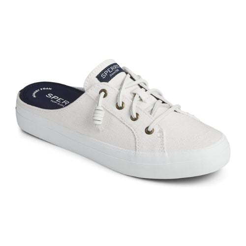 White canvas mule with laces and blue insole.