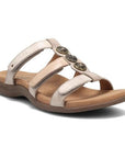 Cream leather sandal with three adjustable straps and three silver medalion details on T-strap. Sandal has brown footbed and outsole.