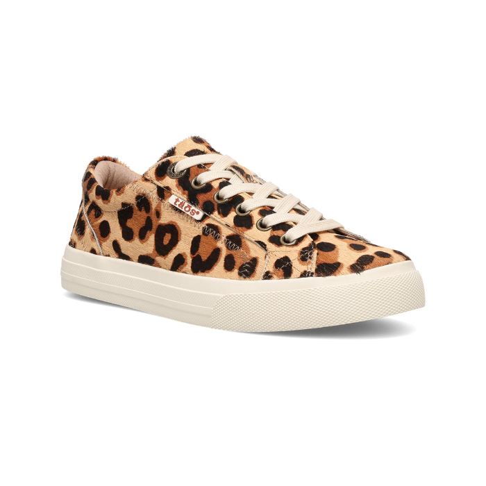 Leopard print pony hair sneaker with white laces, and a white thick rubber outsole.
