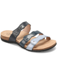 Slide sandal with wavy straps; black strap, dark blue strap and light blue strap, tan Taos logo'd footbed and black outsole.