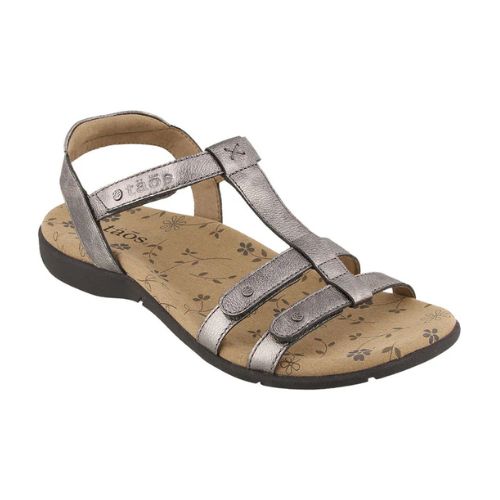 Pewter strappy sandal with metal detail circles and contrast stitching with a floral footbed.