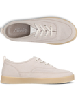 Pair of Light greyish pink casual sneaker with off-white laces, Vionic Logo'd footbed and tan outsole. 