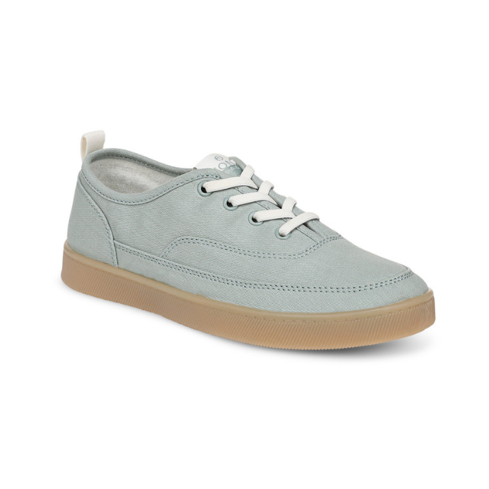 Light blue casual sneaker with white laces and tan outsole. 