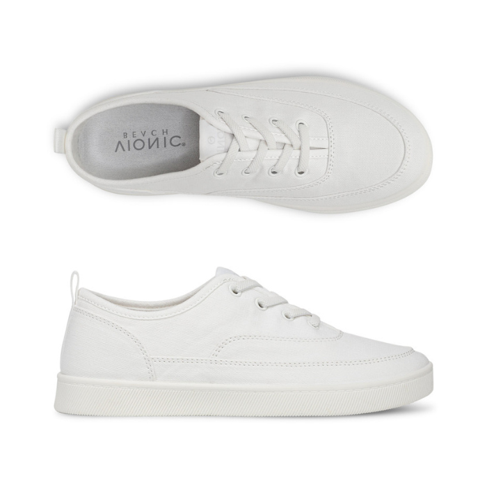 Pair of white casual sneakers with white elastic laces, white Vionic logo'd footbed and white outsole. 