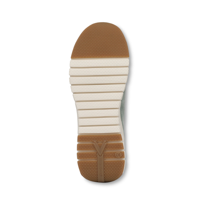 White light treaded outsole with brown section at toe and heel.