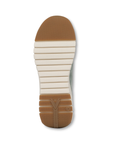 White light treaded outsole with brown section at toe and heel.