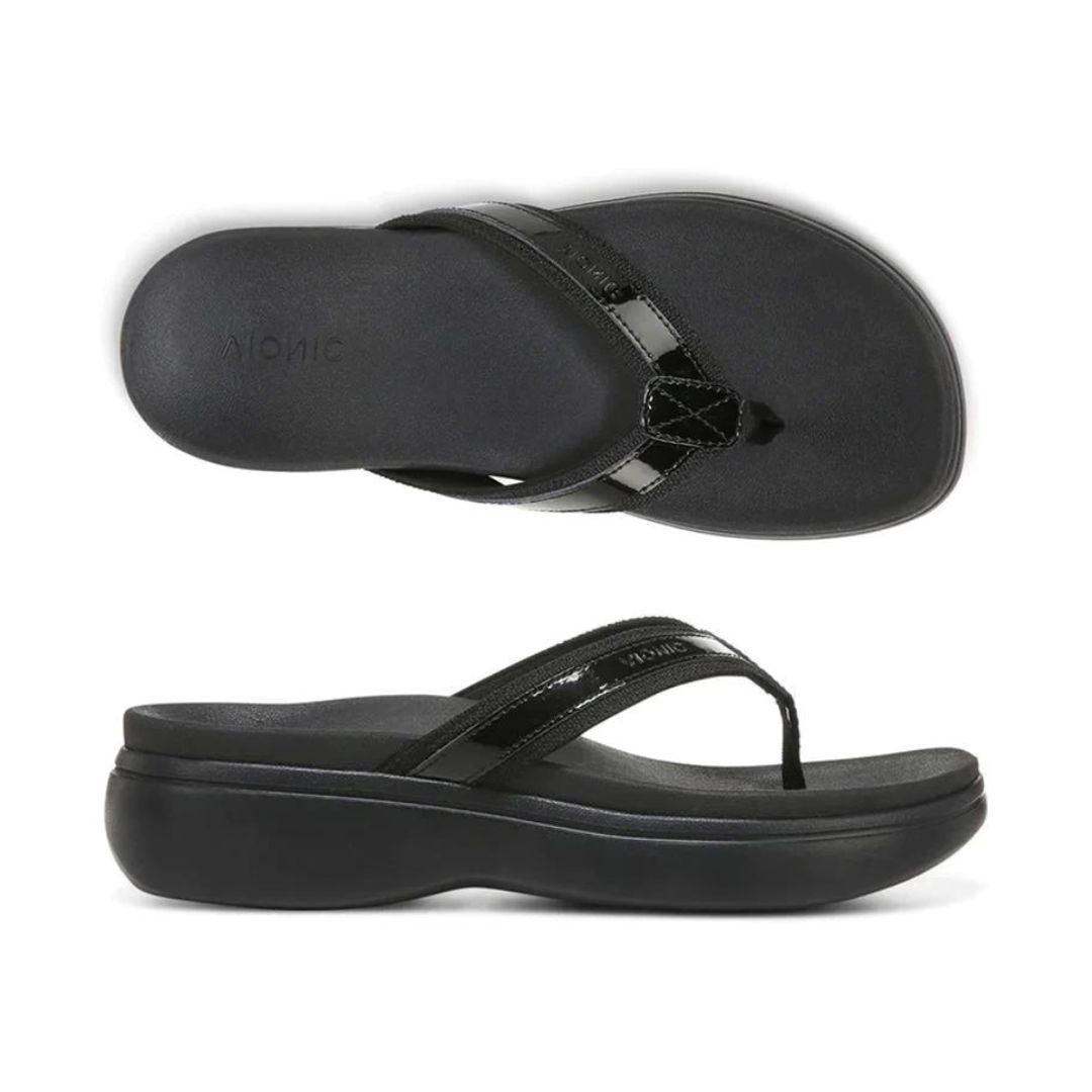 Black thong sandal with wedge outsole.