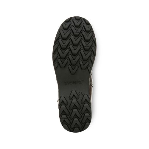 "V" pattern black rubber tread with Vionic logo in middle of ankle boot.