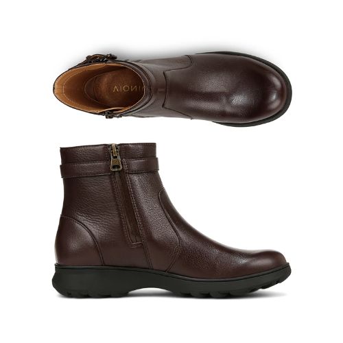 Pair of brown ankle boots with a zipper, side buckle detail and a black outsole.