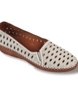 White ballet flat shoe with oval cutouts, shell pattern imprints and brown outsole.