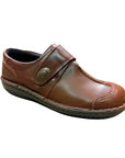 Brown slip on shoe with Velcro cross strap with metal detail and detailing stitching