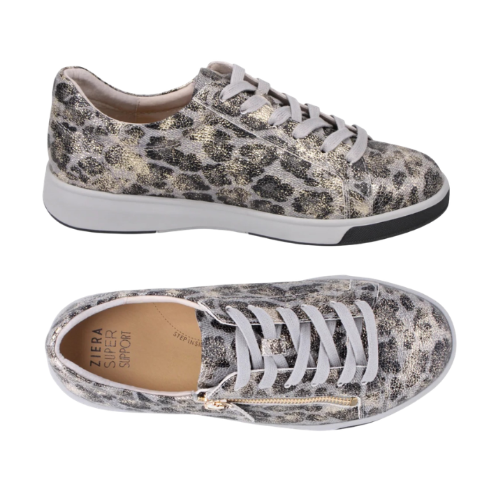 Pair of grey with gold and black leopard print leather low-top sneakers with a side gold zipper, grey laces, tan Ziera logo'd footbed and a thick grey midsole and black outsole.