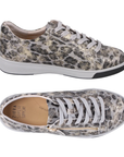 Pair of grey with gold and black leopard print leather low-top sneakers with a side gold zipper, grey laces, tan Ziera logo'd footbed and a thick grey midsole and black outsole.