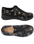 Pair of Black suede sneakers with floral metallic pattern, side zipper, black laces, tan Ziera footbed and black light treaded outsole.