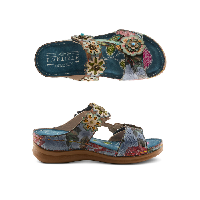 Pair of Bright blue sandal with colorful floral designs and embellishments, blue suede L'Artiste logo'd footbed and brown outsole.