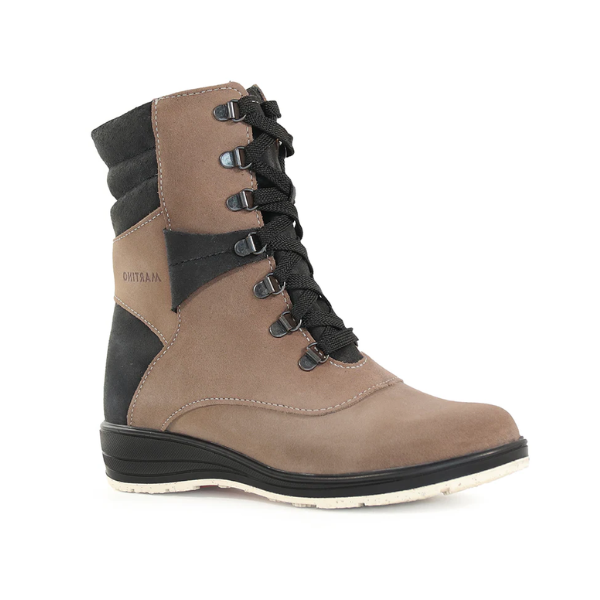 Tara mid-height boot in Taupe. Beige nubuck upper with black accents. Features black laces and a black outsole. 