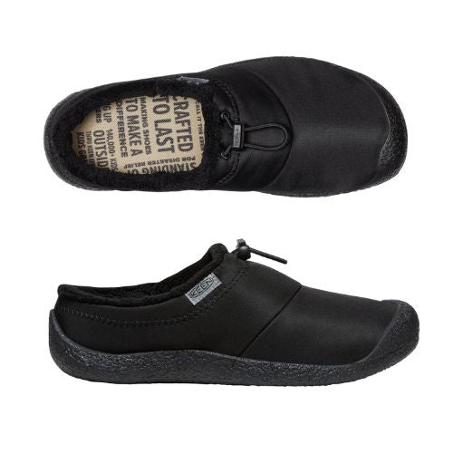 Pair of Black nylon clogs with toe bumper, elastic bungee, beige footbed with brand key words and treaded black outsole.