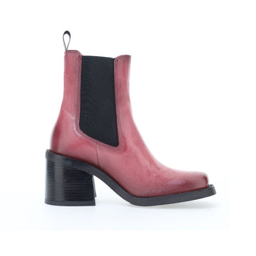 Coral Chelsea boots with chunky stacked heel, elastic side goring, square toe, and heel pull tab.