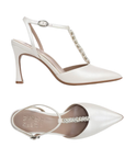 Pair of White high-heeled pumps with embellished t-strap, buckle ankle strap and tan Naturalizer logo'd footbed.