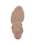 Tan light treaded outsole with Naturalizer logo stamped in middle.