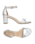 Pair of Silver block heel sandals with buckled ankle strap and tan Naturalizer logo'd footbed.