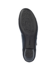 Black light treaded outsole of low block heel Mary-Jane with Rieker logo stamped in middle.