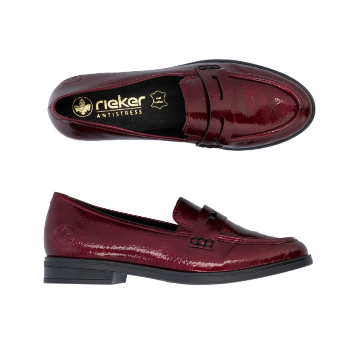 Pair of A red patent loafer with Rieker logo'd footbed and  black rubber outsole.