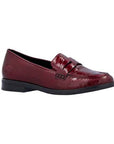 A red patent loafer with black rubber outsole.