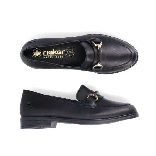 Pair of Black loafer shoes with a silver buckles.