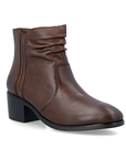 A brown leather ankle boot with a ruched shaft, detailed stitching and a low black block heel.