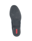 Black outsole with circle tread pattern and red Rieker logo stamped in heel.