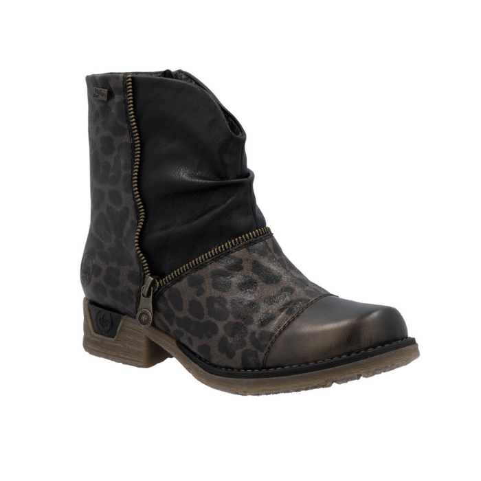 Women's ankle boot in leopard and black with asymmetrical faux zipper and low heel.
