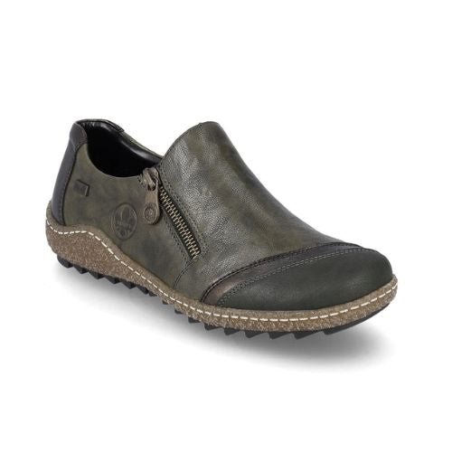 Green slip on leather shoe with zipper closure, darker green accents with a brown midsole and black outsole.
