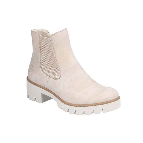 A beige Chelsea ankle boot with a chunky sole and side elastic goring.