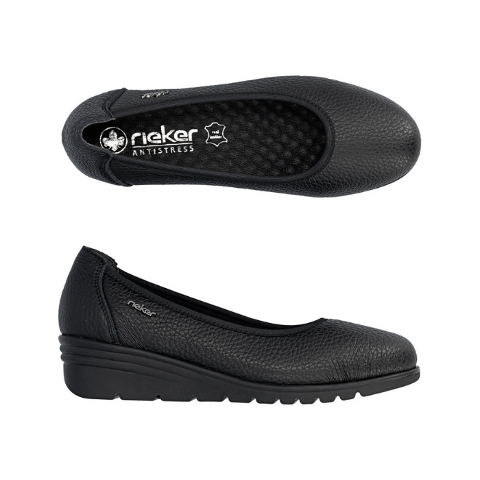 Pair of Black ballet style shoes with low wedge heel and Rieker metal emblem on side.