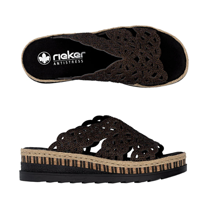 Pair of Brown perforated slide sandals with small black rhinestones, black Rieker logo'd footbed, brown cork midsole with partial jute wrap, black line pattern and a thick black outsole.