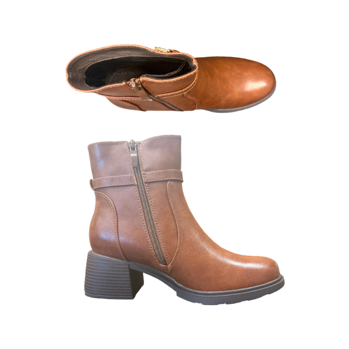 Pair of brown faux-leather ankle boots with a block heel, inside zipper and a decorative strap featuring a double-ring buckle detail.