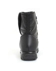 Heel of a black mid-calf black leather boot with a zipper and Velcro closure.